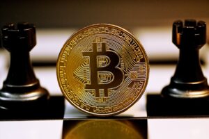 A Bitcoin on a chess board. Source: Unsplash