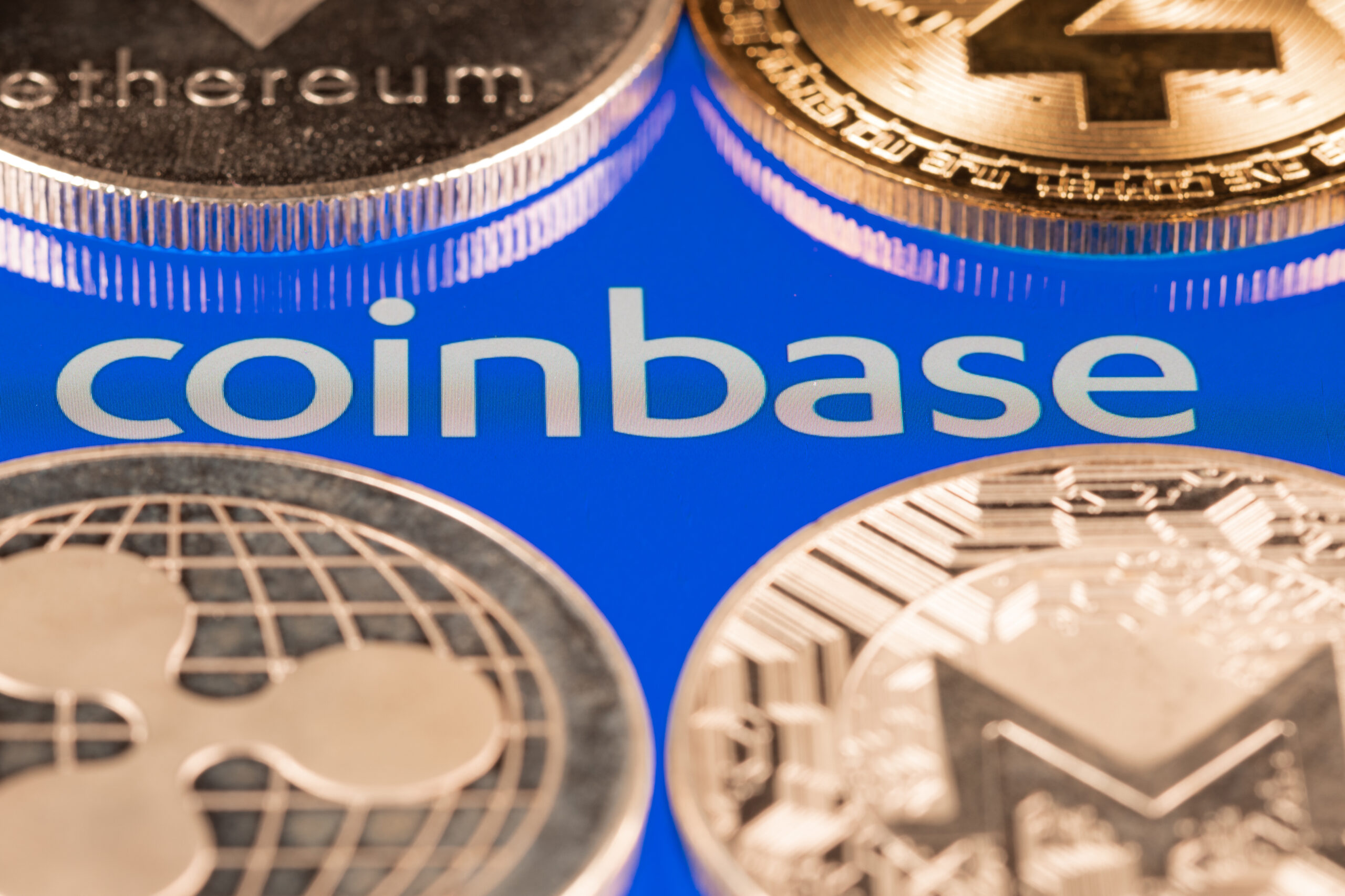 Coinbase and XRP. Pic: Shutterstock