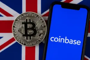 Bitcoin coin and Coinbase app displayed against UK flag, reflecting blockchain and stablecoin momentum in the United Kingdom