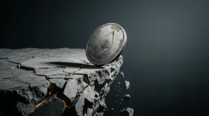Ethereum coin on fractured platform edge symbolizing broken support level and market breakdown