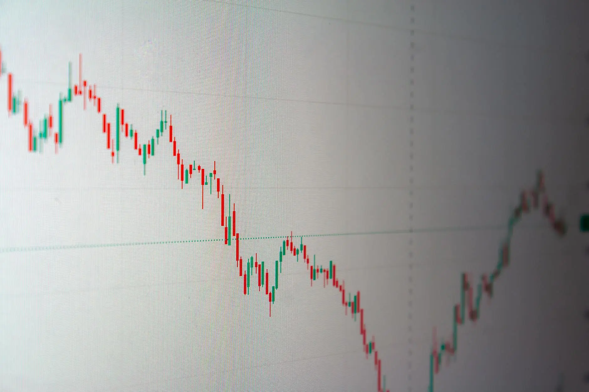 A detailed candlestick chart showing a downward trend in a financial market.