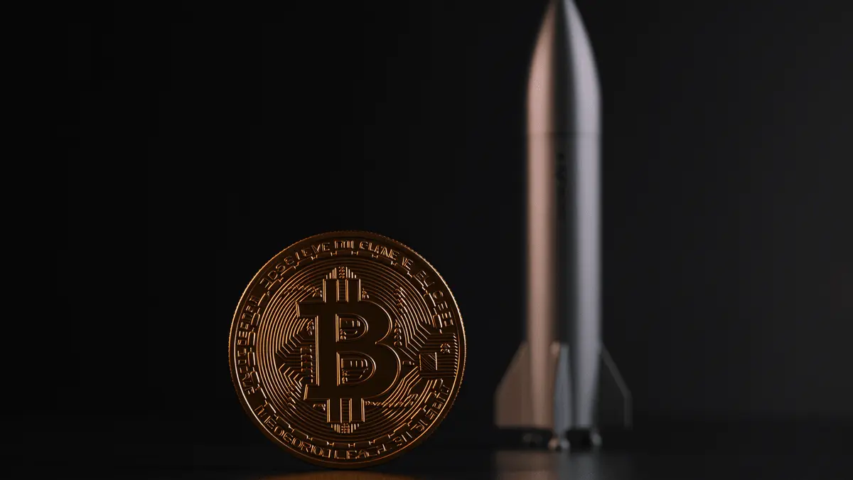 Bitcoin coin with SpaceX Starship rocket on dark background representing corporate treasury holdings