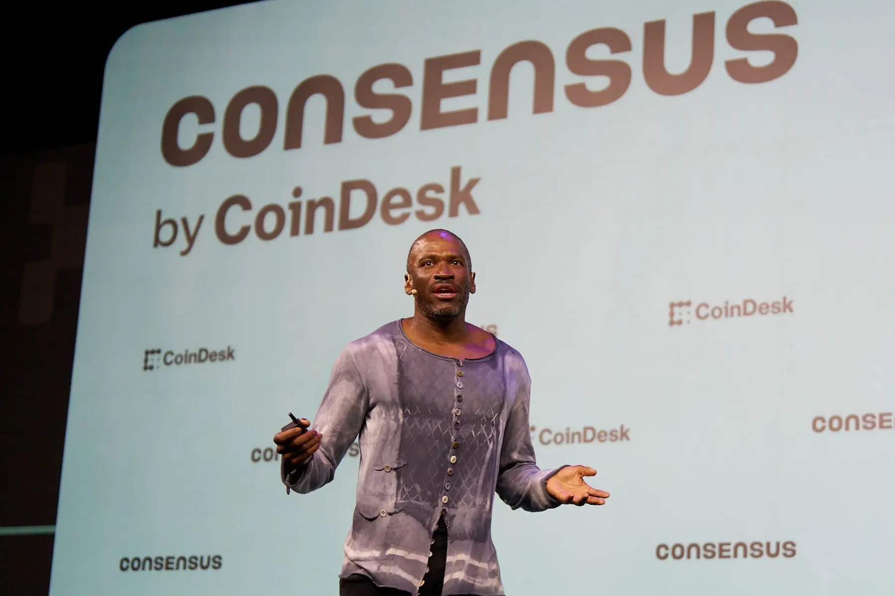 Speaker presenting at Consensus by CoinDesk event.