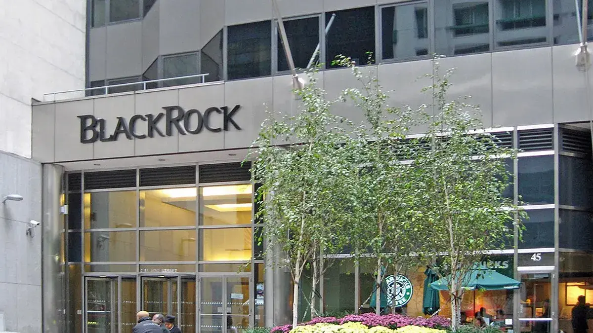 BlackRock building facade with logo and greenery in the foreground