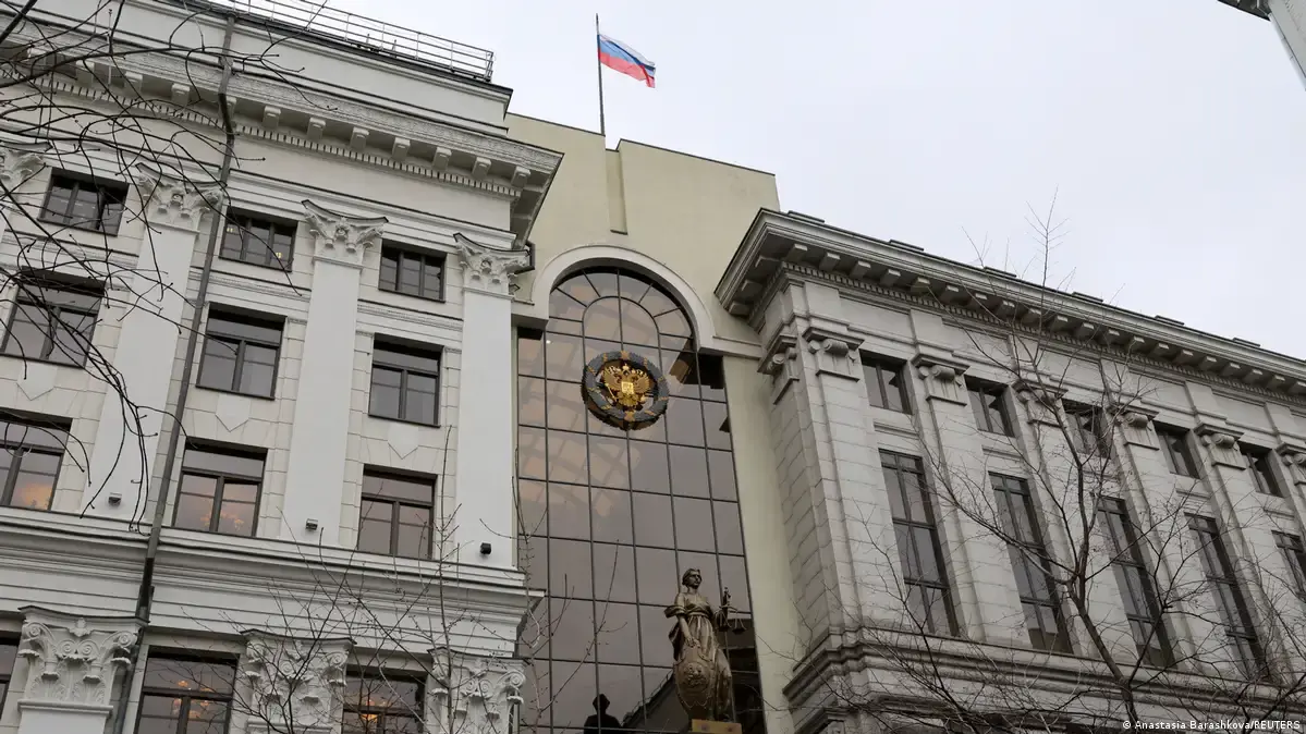 Facade of the Constitutional Court of Russia with a flag and emblem.