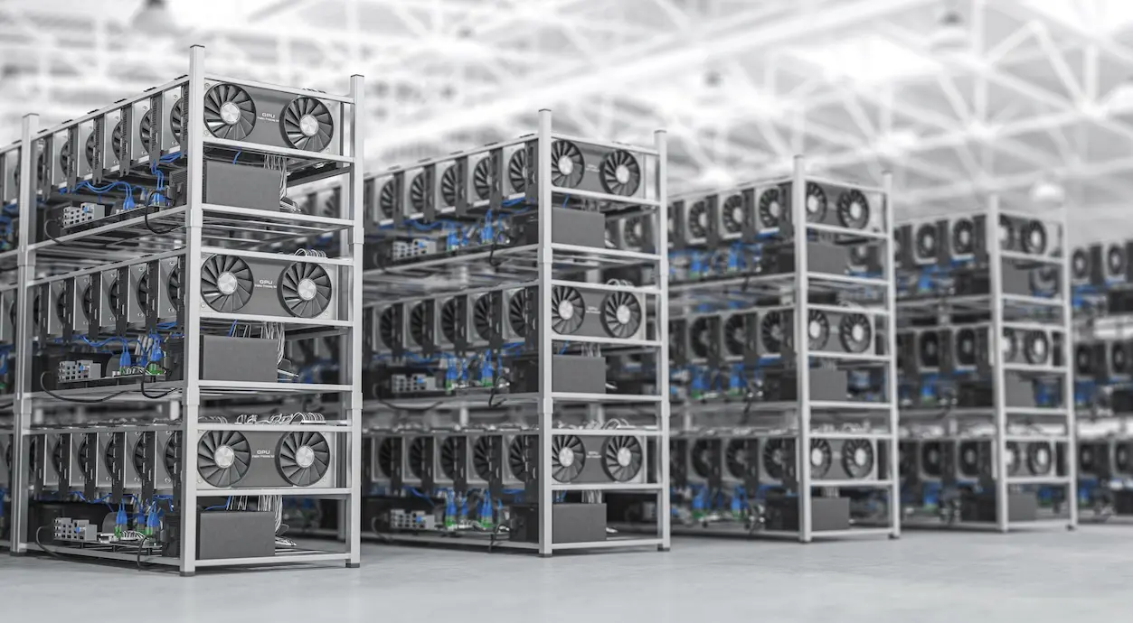 A crypto mining farm with multiple GPU racks and cooling fans in a data center.