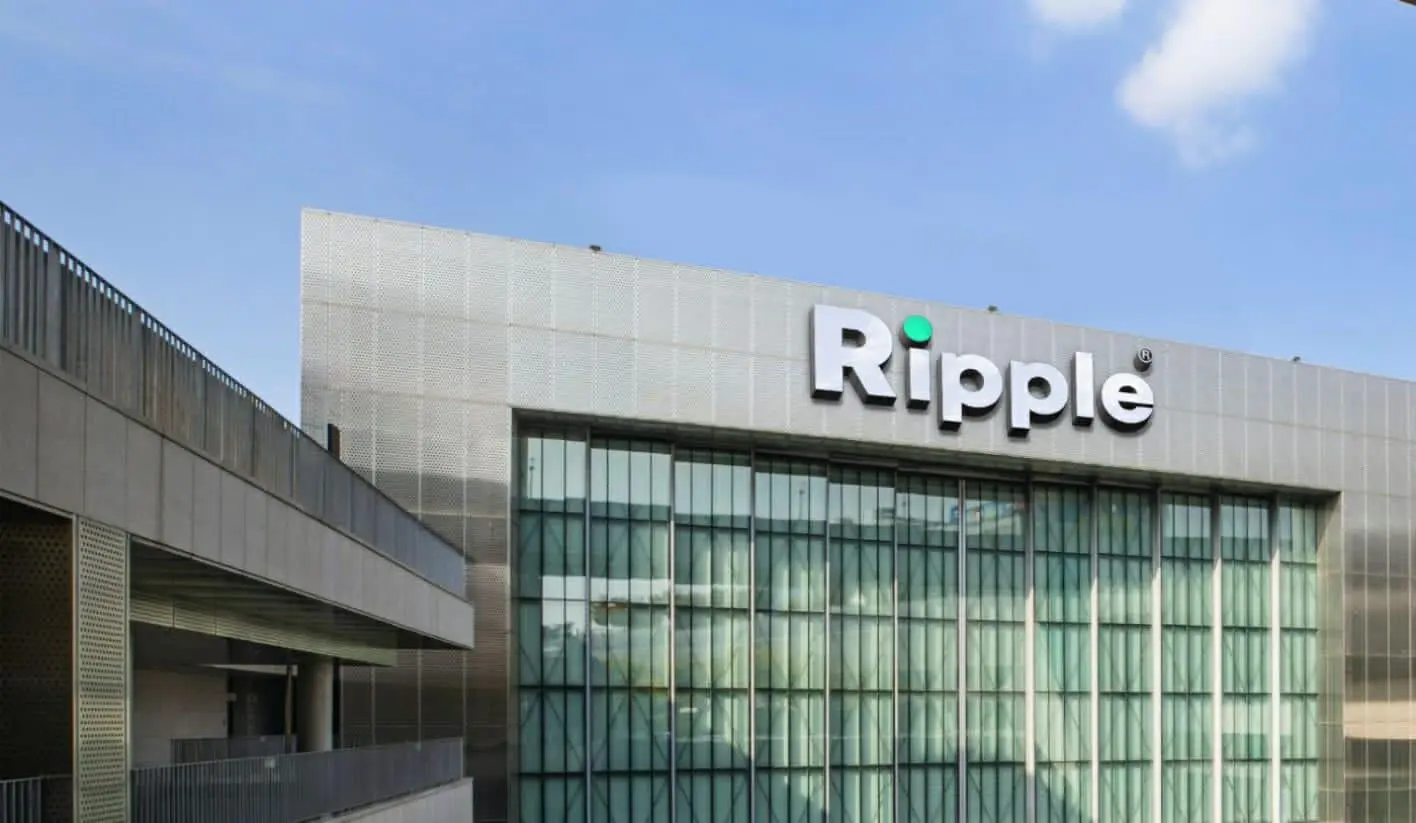 Exterior view of the Ripple office building with its logo prominently displayed.