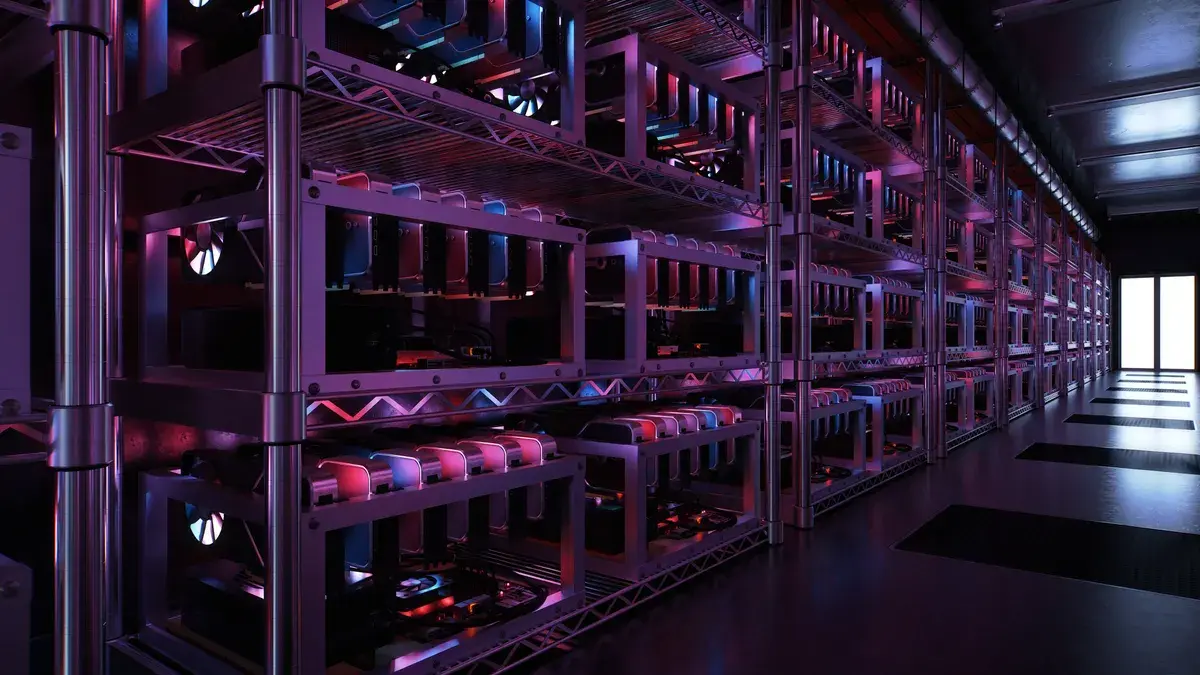 Rows of cryptocurrency mining rigs with GPUs on industrial metal shelving in a data center