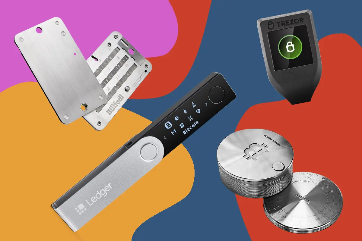 Various hardware crypto cold wallets including a Ledger Nano, Trezor, and metal seed backup plates.