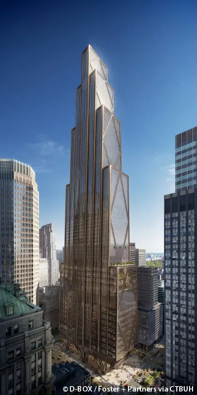 Exterior view of the JPMorgan Chase headquarters skyscraper in New York City with bronze-colored glass facade